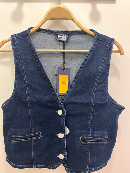 Chaleco vaquero mujer sin mangas – Estilo casual urbano, con botones elegantes y bolsillos decorativos Perfecto para looks denim modernos y versátiles
